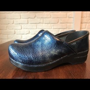 Dansko Blue patent leather clogs